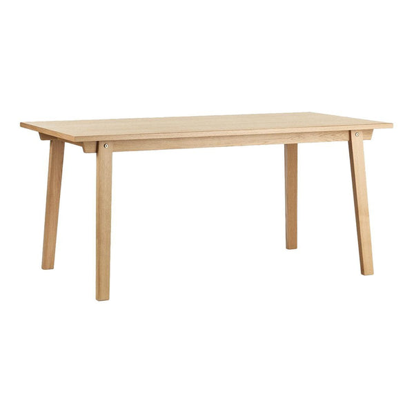 Light natural wood dining table with a smooth finish and simple, modern design. Sturdy legs support a rectangular top.
