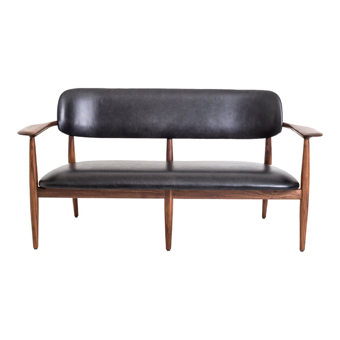 Mid-century modern sofa in black leather with walnut wood frame, showcasing sleek lines and minimalist design.