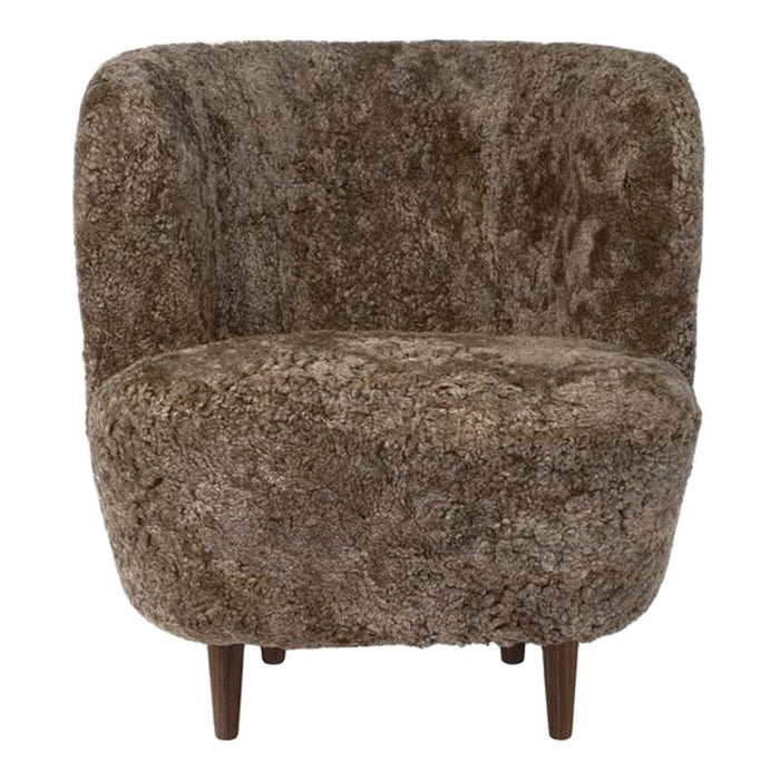 Textured, deep brown plush armchair with a soft, fuzzy pattern and wooden legs, perfect for cozy interiors.