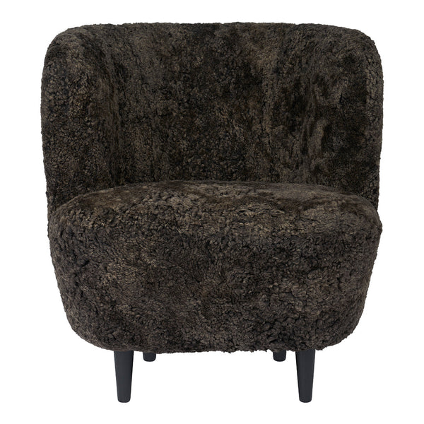 Brown textured accent chair with a soft, shaggy pattern and black legs. Ideal for cozy, modern decor.
