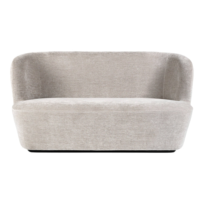 Light gray upholstered sofa with smooth, curved lines and a minimalist design. Perfect for modern living spaces.