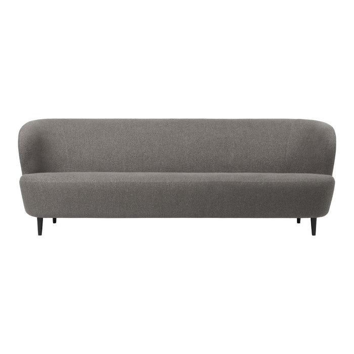 Gray upholstered sofa with a smooth, minimalist design and black tapered legs. Perfect for modern living spaces.