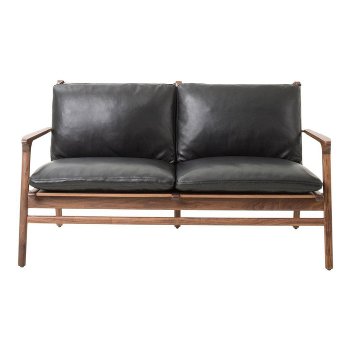 Black leather sofa with wooden frame, featuring a minimalist design and smooth, sleek finish. Perfect for modern interiors.