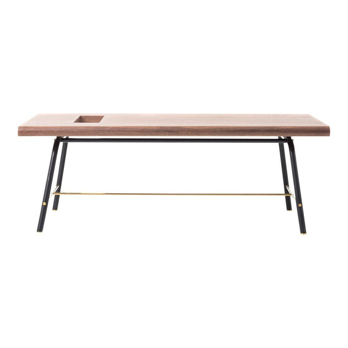 Modern wooden desk with a warm brown finish, sleek black legs, and subtle gold accents for a stylish look.