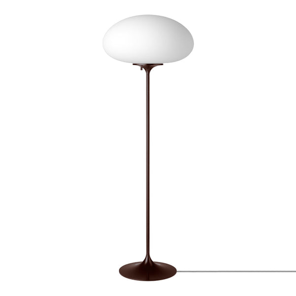 Modern floor lamp featuring a smooth white dome shade and a sleek brown base for a chic, minimalist look.
