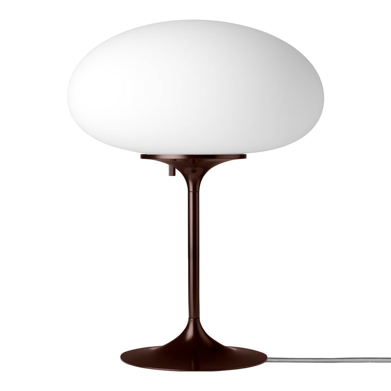 Modern white glass lamp on a brown base, featuring a sleek, minimalist design. Perfect for contemporary decor.