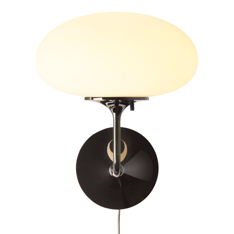 Sleek black wall-mounted lamp with a smooth white oval shade, perfect for modern decor.