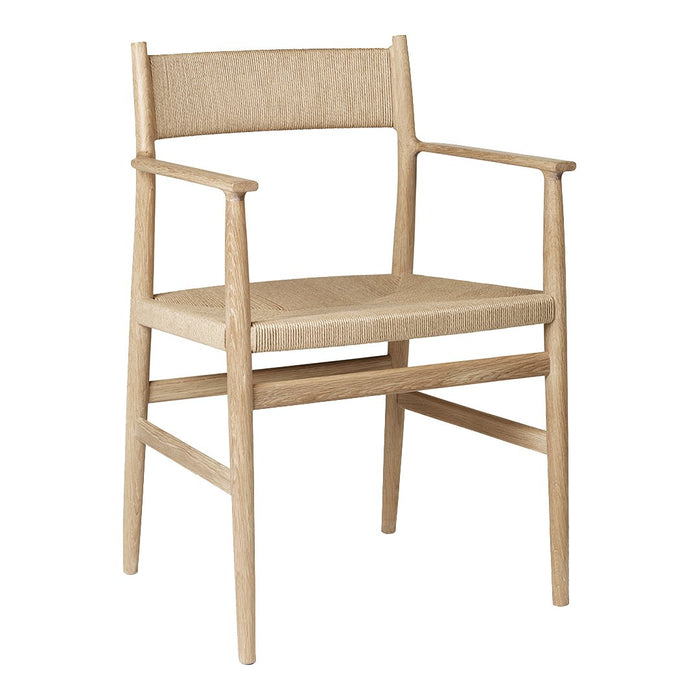 Natural wood armchair with a woven beige seat and backrest, showcasing a minimalist and contemporary design.