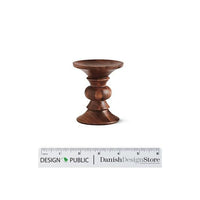 Elegant wooden candlestick holder in rich brown tones with a smooth, polished finish and classic, fluted design.