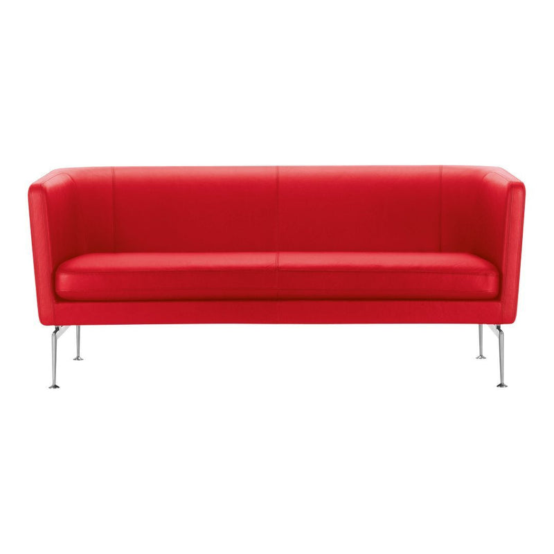 Bright red modern sofa with a sleek design and smooth leather finish, featuring minimalist metal legs.