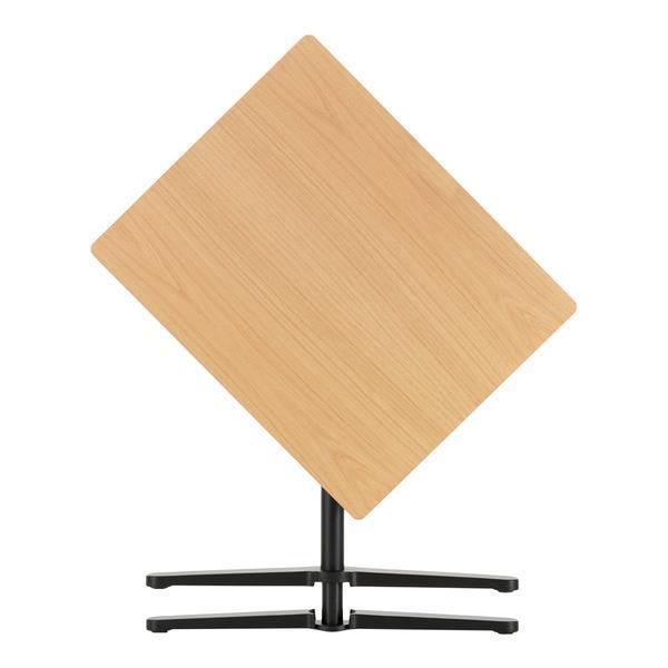 Light oak wood tabletop with a smooth finish, supported by a sleek black metal base in a unique diamond shape.