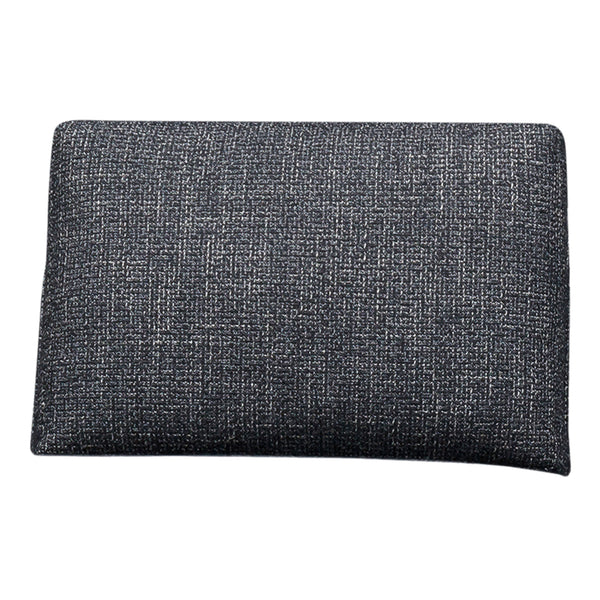 Textured dark gray fabric with subtle woven pattern, ideal for stylish and modern accessories.