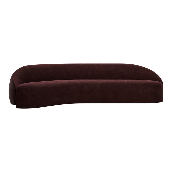 Elegant curved sofa in deep burgundy velvet with a smooth, seamless finish, perfect for modern living spaces.