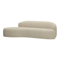 Curved beige sofa with a textured fabric, showcasing a minimalist design for modern interiors.