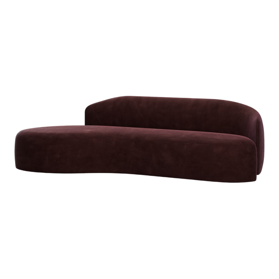 Burgundy velvet modern sofa with smooth curves and a minimalist design. Elegant and contemporary home accent.