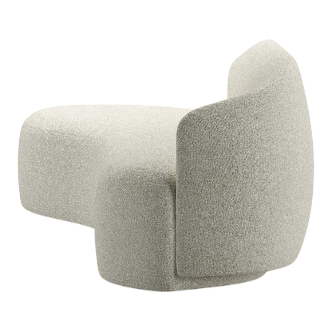 Light gray textured fabric lounge chair with a modern abstract shape. Soft, contemporary aesthetic for stylish interiors.