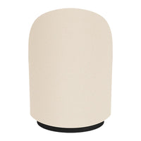 Beige cylinder lamp with a smooth surface and a black base, perfect for modern decor. Simple and elegant design.