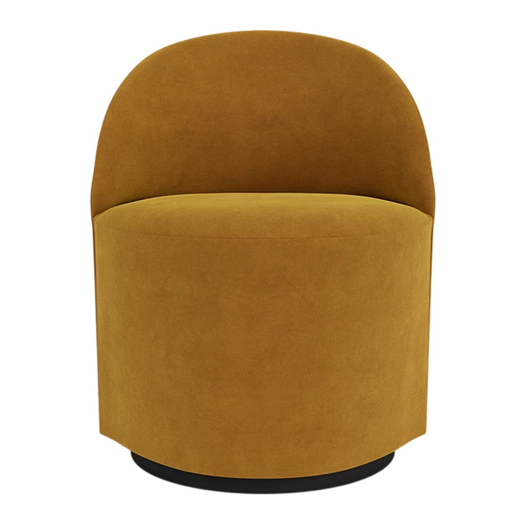 Sleek mustard yellow accent chair with a rounded silhouette and subtle velvet texture against a black base.
