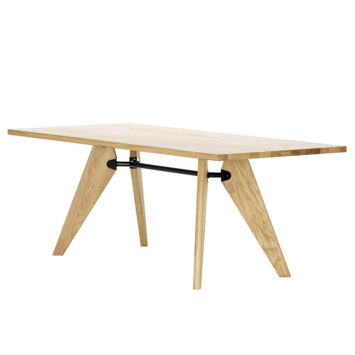Light natural wood dining table with a sleek design and contrasting black metal support, featuring clean lines and geometric patterns.