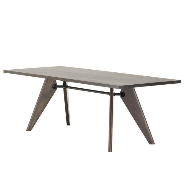 Modern wood dining table with a sleek gray finish and angular, geometric legs for a stylish touch.