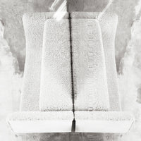 Textured white upholstery with subtle patterns, offering a modern and minimalist aesthetic. Perfect for contemporary decor.