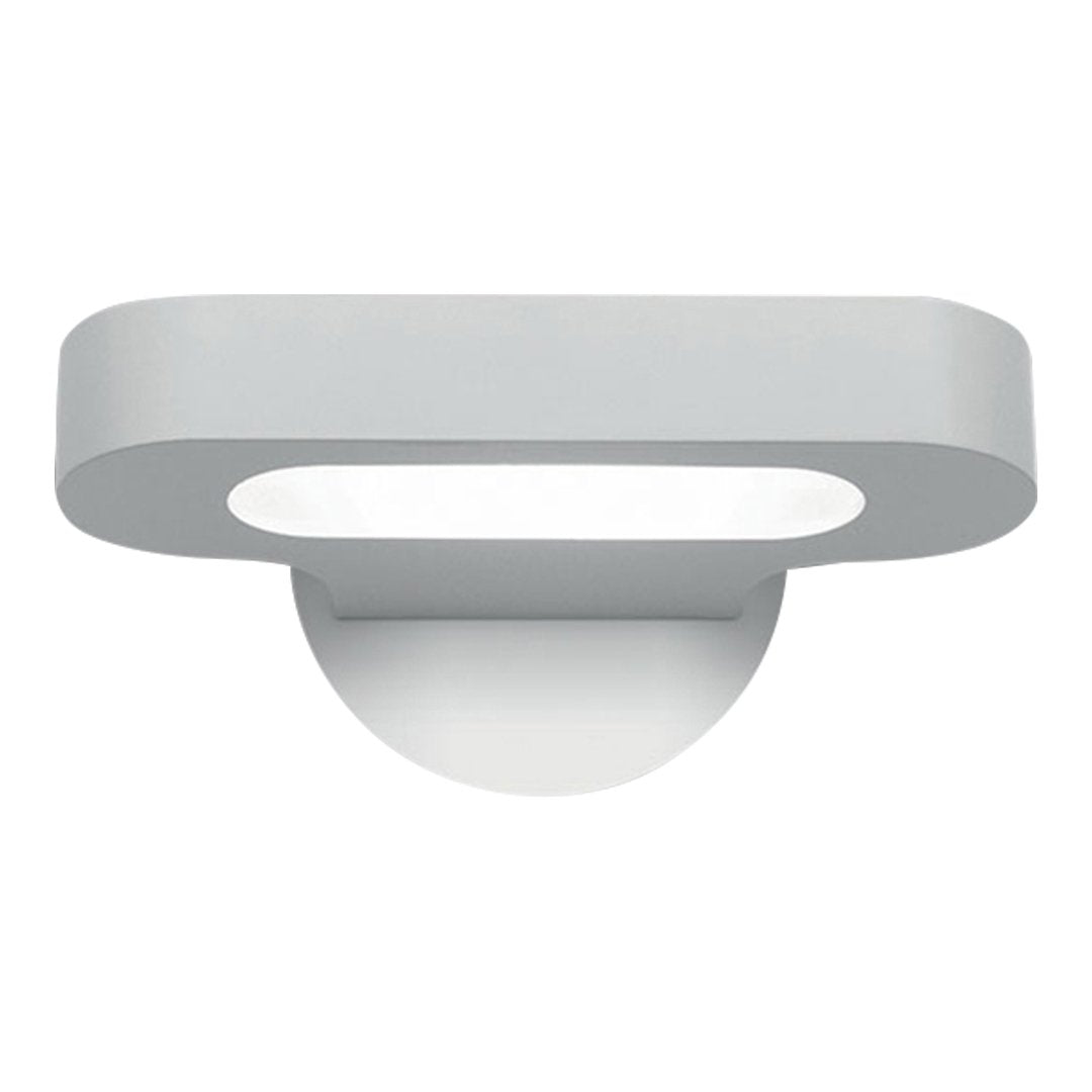 Sleek, modern wall light in smooth matte white finish with a minimalist oval shape and circular mount.