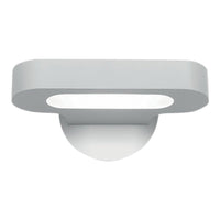 Sleek modern wall light in a smooth, matte white finish with a contemporary oval design.
