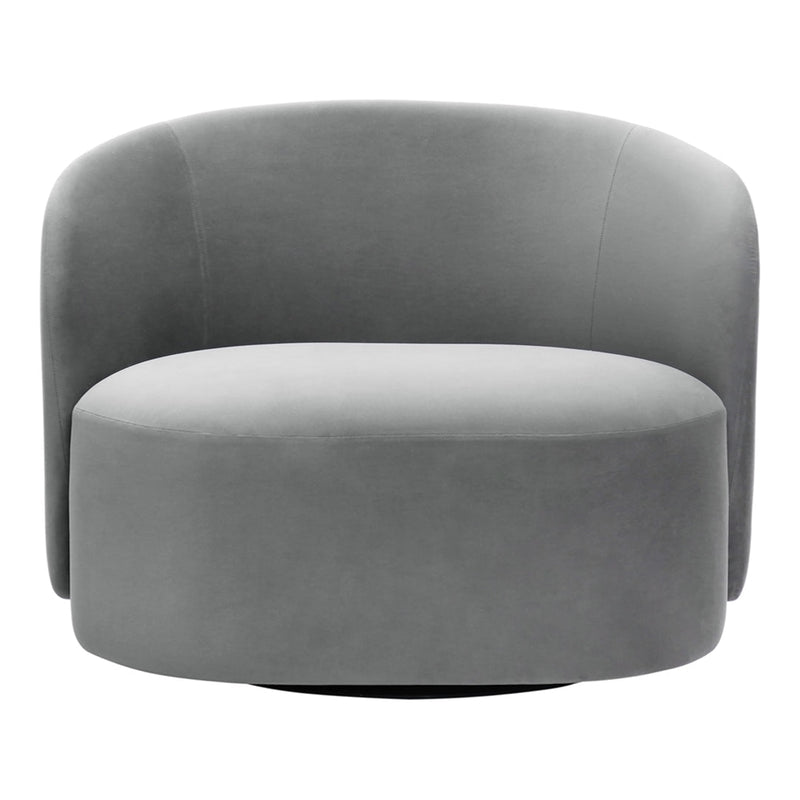 Round gray accent chair in soft velvet. Smooth, modern design with subtle curves and a sleek finish. Perfect for any space.