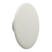 White circular knob with a textured surface, perfect for modern or minimalist decor styles.