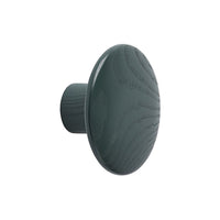 Dark green round cabinet knob with a textured wood grain pattern. Ideal for adding a modern touch to furniture.
