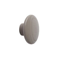 Grey wooden knob with a smooth, round shape and subtle wood grain pattern. Perfect for modern home decor.
