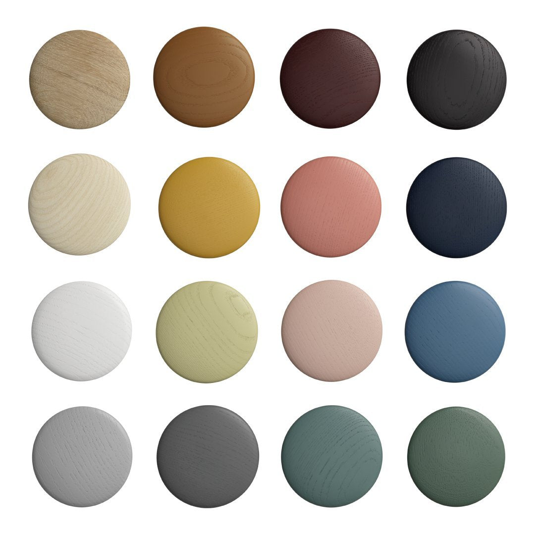 Color swatches featuring wood tones, earth shades, pastels, and bold hues in a circular pattern. Ideal for design selection.