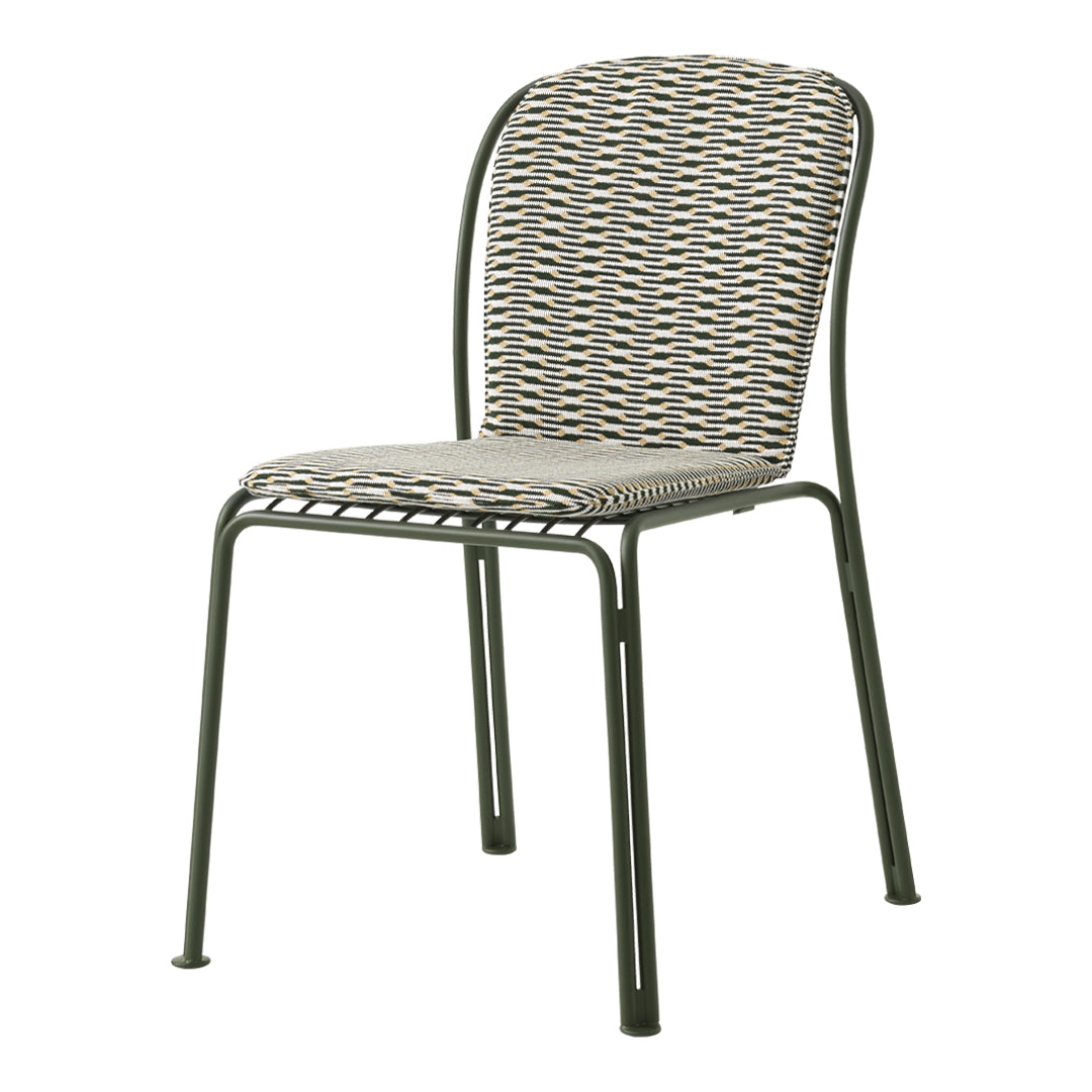 Stylish chair with a gray and cream geometric woven pattern and a sleek green metal frame. Ideal for modern decor.