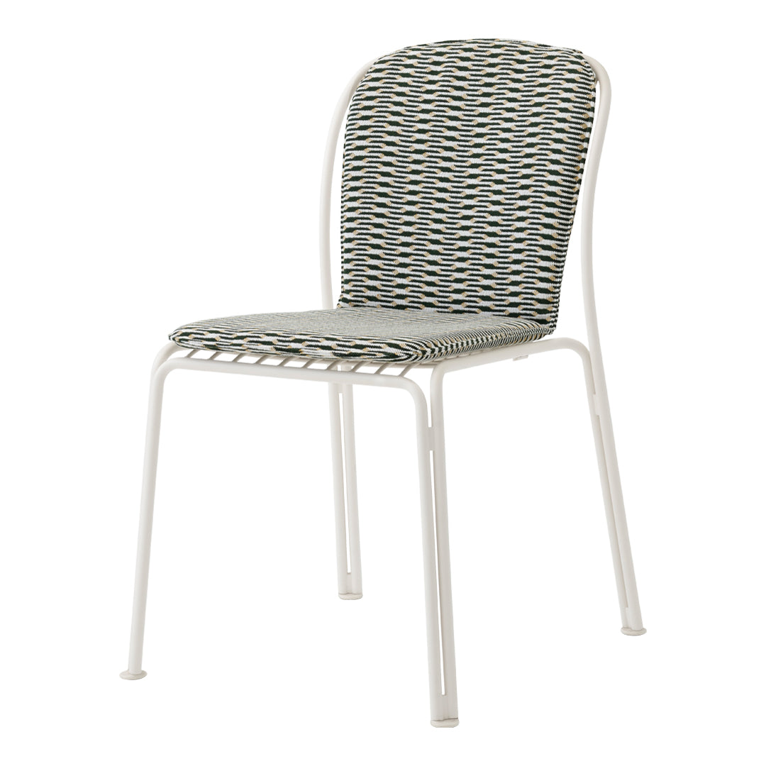 White metal chair with a patterned seat in blue and green stripes. Modern design for indoor or outdoor use.