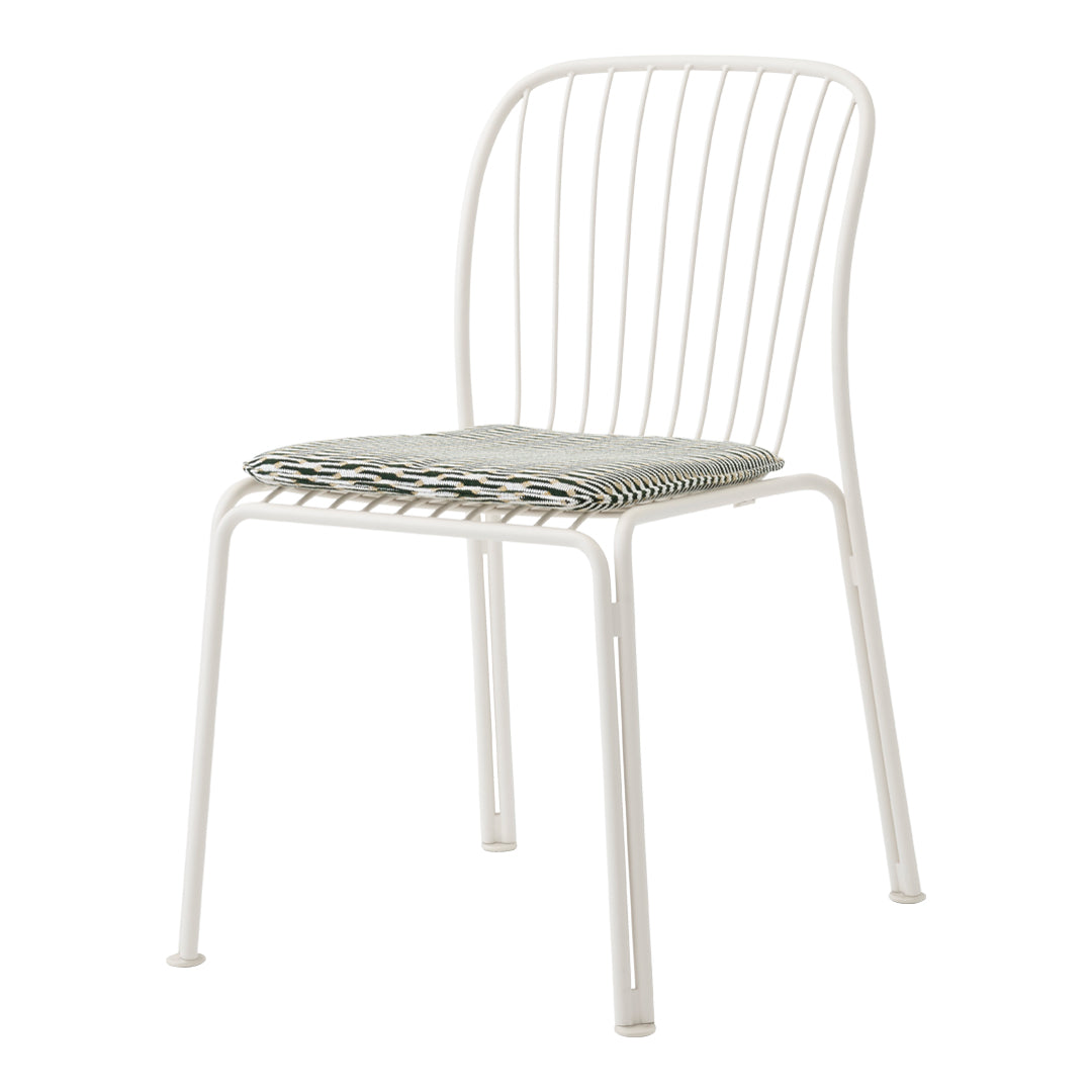 White metal chair with a striped grey and white seat cushion, featuring a minimalist design and open backrest.