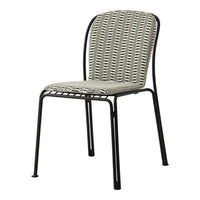 Black metal chair with a woven seat in a geometric pattern of beige, green, and navy blue. Perfect for modern decor.