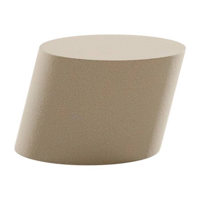 Beige textured side table with a sleek, modern design and an angled silhouette. Perfect for contemporary decor.