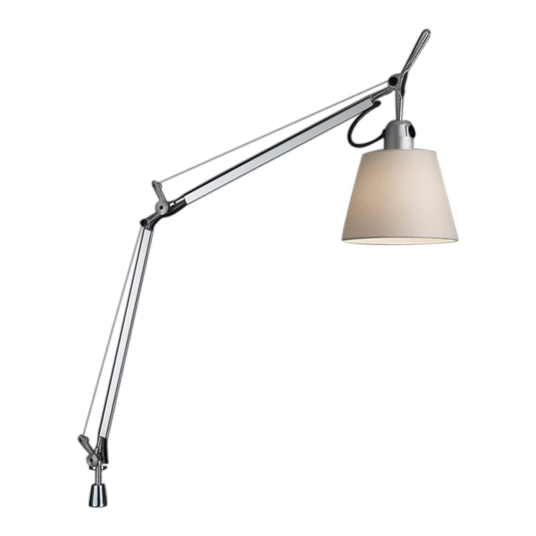 Silver adjustable lamp with a cream-colored shade and sleek, minimalist design. Modern accent for any space.