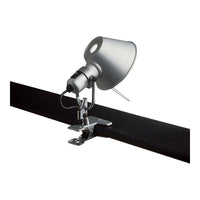 Silver track light fixture with a sleek, modern design; minimalist style with a smooth finish. Black mounting bar visible.