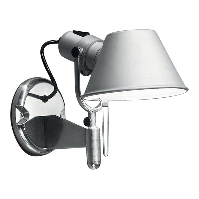 Sleek silver wall lamp with a minimalist white shade and clear glass base. Modern design for stylish interiors.
