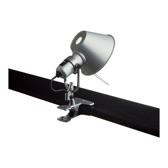 Silver adjustable track light with a sleek metallic shade and black track, featuring a smooth modern design.