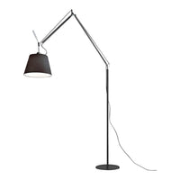 Adjustable black and silver floor lamp with a sleek, minimalist design and a cylindrical shade. Modern aesthetic, versatile style.