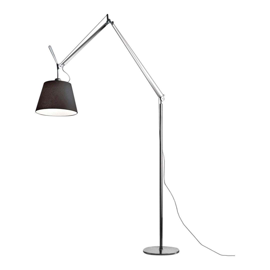 Sleek chrome floor lamp with a modern black shade, showcasing a minimalist design and elegant finish.