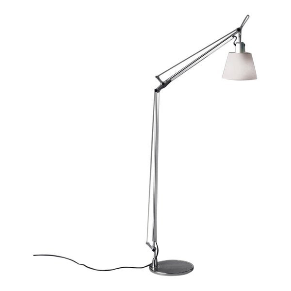 Sleek chrome floor lamp with a white glass shade and a minimalist design, perfect for modern décor.