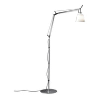 Sleek silver floor lamp with a minimalist design and a white shade, perfect for modern decor.