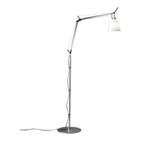 Modern floor lamp with a sleek black and silver design, featuring a white glass shade for a minimalist look.