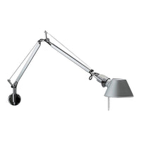 Silver articulated lamp with a sleek metallic finish and minimalist design, featuring a simple gray shade.