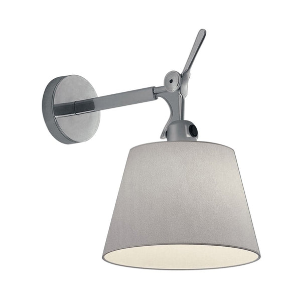 Modern wall lamp with a sleek chrome finish and a soft gray fabric shade. Minimalist design complements any decor.