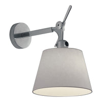 Sleek silver wall lamp with a soft gray fabric shade, elegant and minimalist design. Ideal for modern decor.