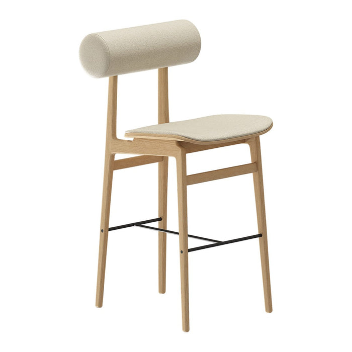Modern beige chair with a rounded backrest and natural wood legs, featuring minimalist design and smooth surfaces.